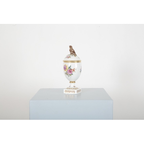 192 - A ROYAL COPENHAGEN PORCELAIN LIDDED URN

with owl finial (chipped), decorated with a profusion of fl... 