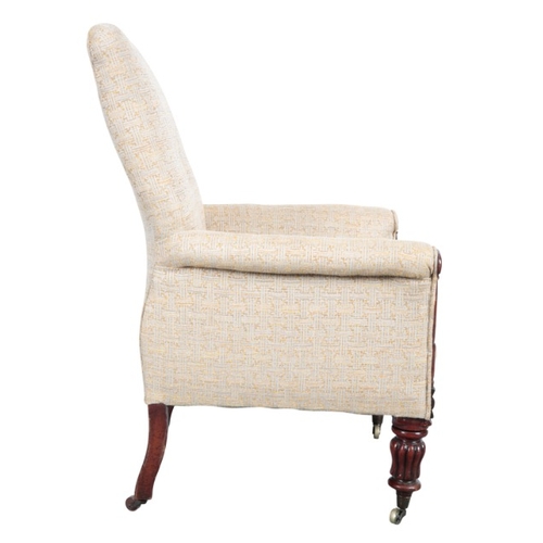 195 - A REGENCY MAHOGANY ARMCHAIR

the tall button back over a square seat, the outswept arms carved to th... 