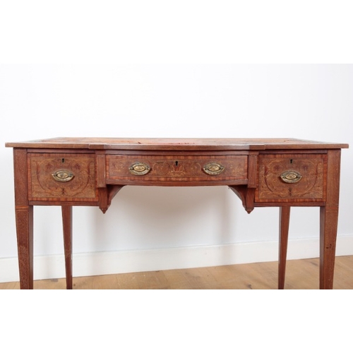 197 - AN EDWARDIAN MAHOGANY BOWFRONT WRITING TABLE

inlaid with satinwood crossbanding and floral marquetr... 