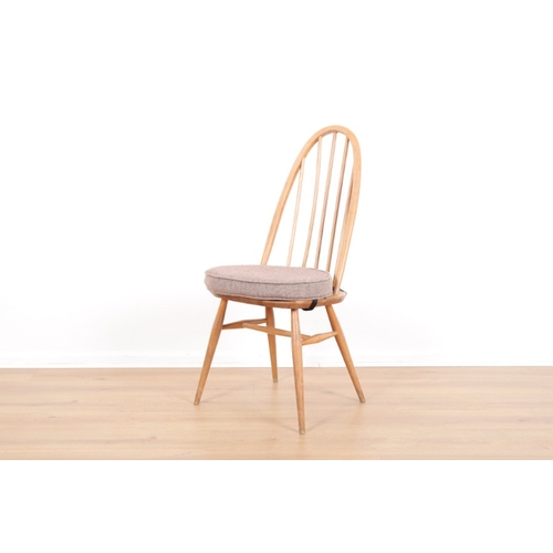 202 - ERCOL, MODEL 365: FOUR BEECH AND ELM 'WINDSOR DINING CHAIRS

mid-century modern; together with anoth... 