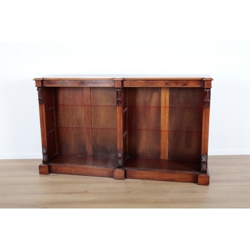 433 - A VICTORIAN BREAKFRONT MAHOGANY BOOKCASE

with satinwood stringing and acanthus corbel detailing, te... 