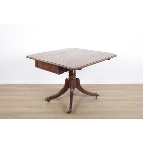 45 - A MAHOGANY DROP LEAF TABLE

Regency or later, with one frieze drawer over turned column, terminating... 