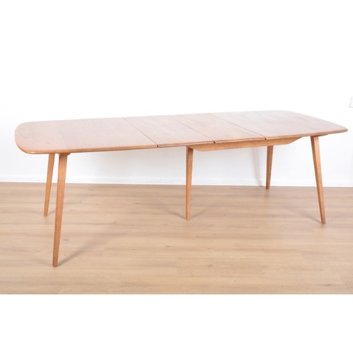 49 - ERCOL, MODEL NO. 444: AN ELM AND BEECH EXTENDING 'GRAND PLANK' TABLE

mid-century modern, with splay... 