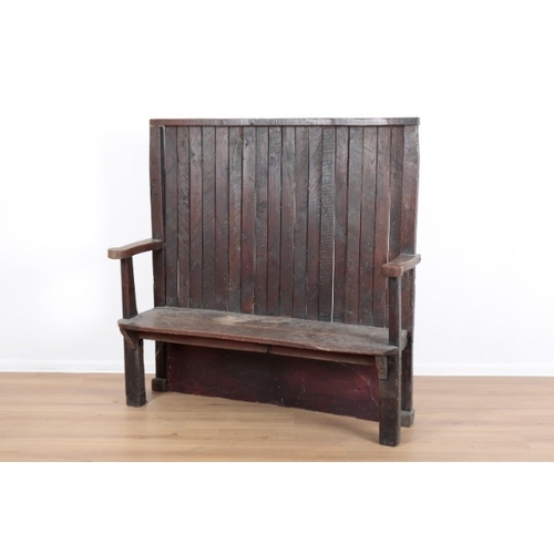 59 - AN 18TH CENTURY STYLE NAIVE OAK CURVED BACK SETTLE

late 19th/early 20th century, with outswept curv... 