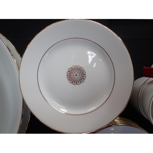 146 - A LIMOGES SPECIAL ORDER PORCELAIN DINNER SERVICE

gilt on white, with 'JB' beneath, 84 pieces, with ... 