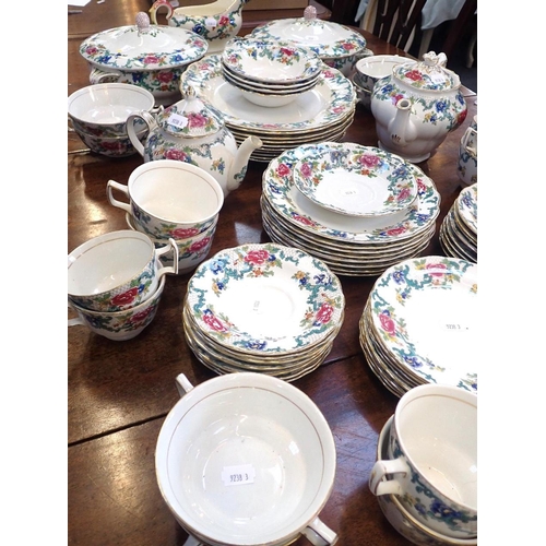 147 - A QUANTITY OF BOOTH'S 'FLORADORA' DINNER AND TEA WARE

including serving dishes, two sizes of cups, ... 