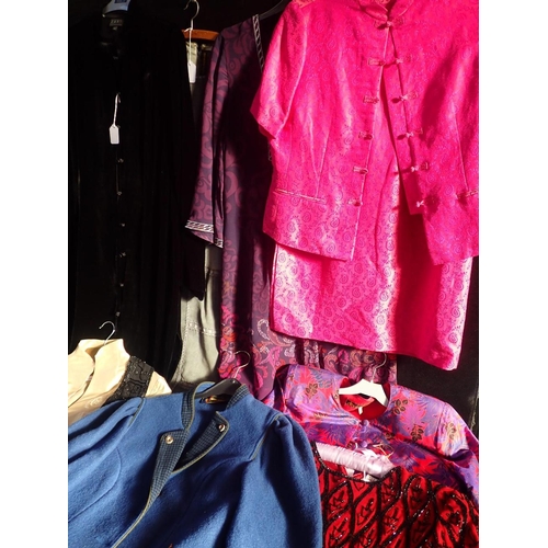 155 - A QUANTITY OF VINTAGE CLOTHING

including an East black velvet coat