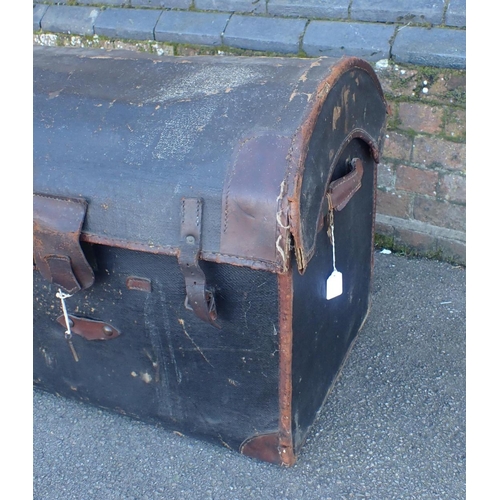 172 - A DOME-TOP CANVAS COVERED WICKER TRUNK

19th century, with lining and original tray, 69cm wide