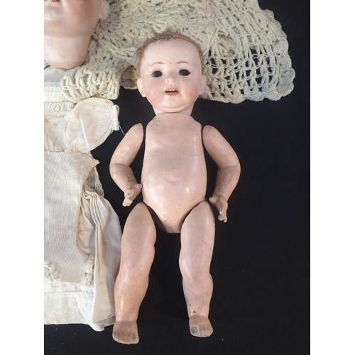 180 - MORIMURA BROTHERS, JAPAN; A BISQUE HEADED DOLL

marked 'MB, 2, Japan' with composition body (for res... 