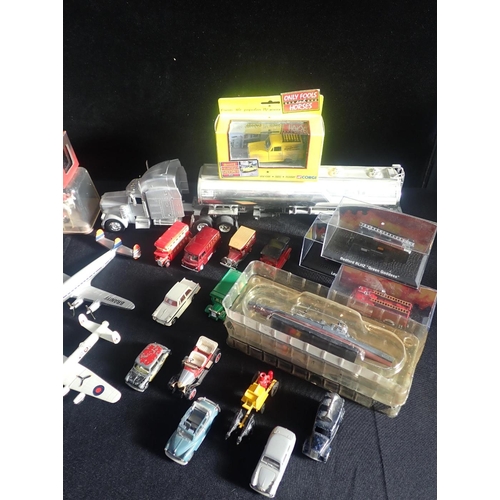 184 - A COLLECTION OF VARIOUS DIECAST MODELS

Including planes, cars, trucks and ships, loose and boxed mo... 