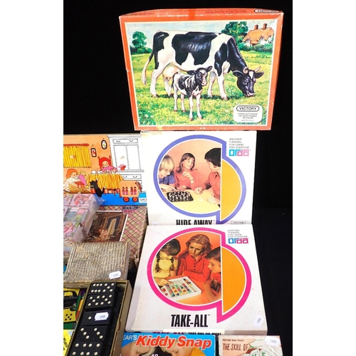 185 - A COLLECTION OF GAMES

including jig-saws, cards, dominoes, children's games etc.