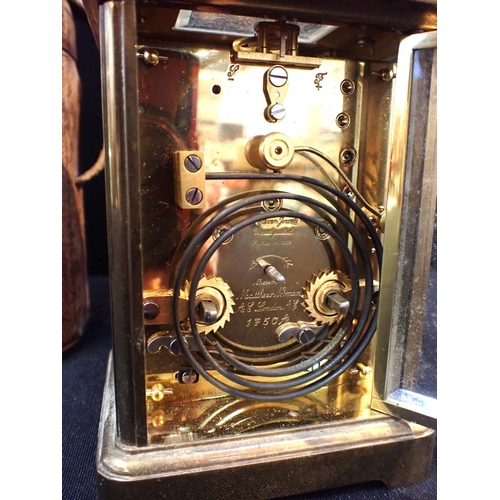 191 - A MATTHEW NORMAN BRASS CARRIAGE CLOCK

striking on a coiled gong, movement numbered 1750A, 17cm high... 