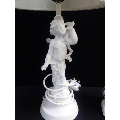 199 - A PAIR OF TABLE LAMPS

with moulded classical style decoration, with another cherub form table lamp