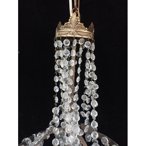 202 - A NEOCLASSICAL STYLE CHANDELIER

with prismatic drops