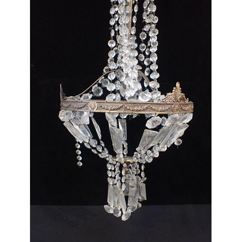 202 - A NEOCLASSICAL STYLE CHANDELIER

with prismatic drops