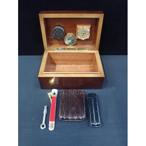 237 - AN ITALIAN MAHOGANY HUMIDOR

with internal temperature gauge, 25cms wide, with two leather cigar hol... 