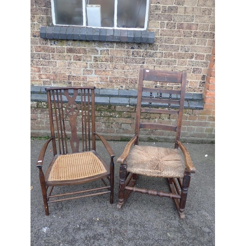 637 - AN 18th CENTURY COUNTRY ROCKING CHAIR

(missing one back spindle) and a later wheel back armchair