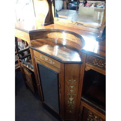 642 - A LATE VICTORIAN INLAID ROSEWOOD PARLOUR CABINET

the lower mirrored section flanked by cupboards an... 