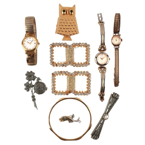 237 - A COLLECTION OF COSTUME JEWELLERY

including an owl brooch, together with two paste buckles, a rolle... 