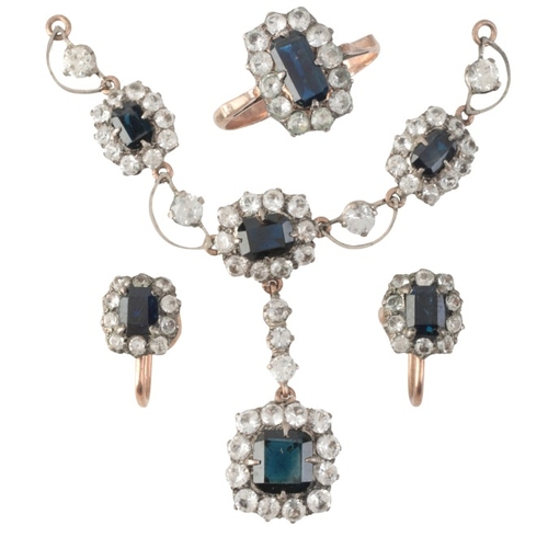 238 - A SAPPHIRE AND PASTE CLUSTER SUITE

in 9ct gold, including a ring, together with a pair of earrings ... 