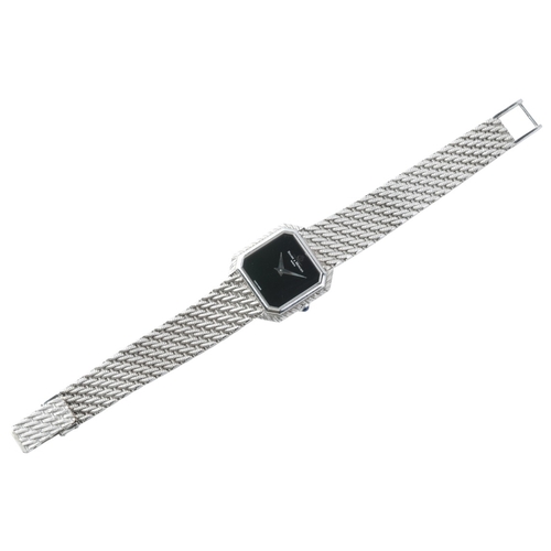 250 - BAUME ET MERCIER: A LADY'S DRESS WATCH

in 18ct white gold, circa 1980s, with manual wind movement, ... 