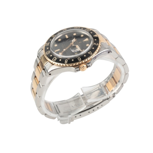 266 - ROLEX GMT-MASTER: A GENTLEMAN'S BI-METAL BRACELET WATCH

with automatic movement, the black dial wit... 