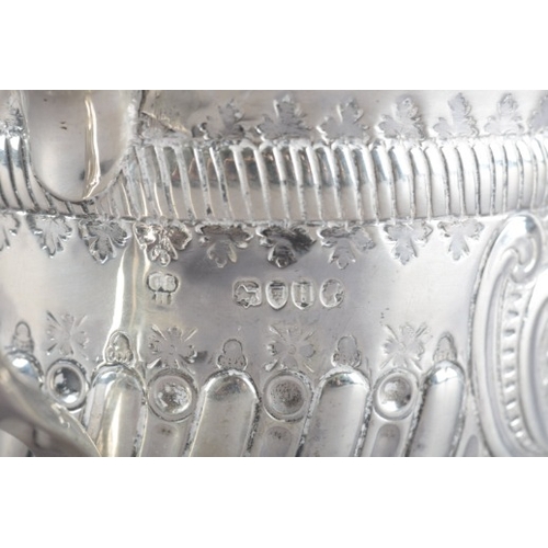 418 - A VICTORIAN SILVER PORRINGER

by Charles Stuart Harris, London 1883, of 17th century design, with tw... 