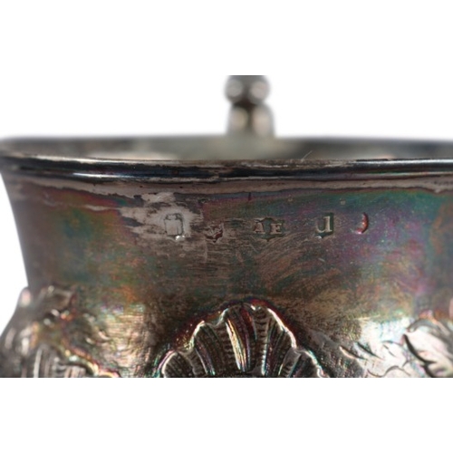 436 - A GEORGE III SCOTTISH SILVER CHRISTENING TANKARD

by Adam Elder, Edinburgh 1826, with floral repouss... 