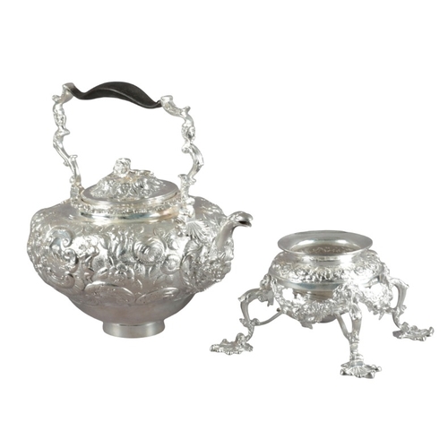 455 - A GEORGE III SILVER TEA KETTLE AND STAND

by Craddock & Reid, London 1817, the bulbous kettle richly... 