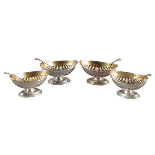 516 - A SET OF VICTORIAN SILVER SALTS

by Robert Sebrings, London 1894, with oval part gadrooned bodies an... 