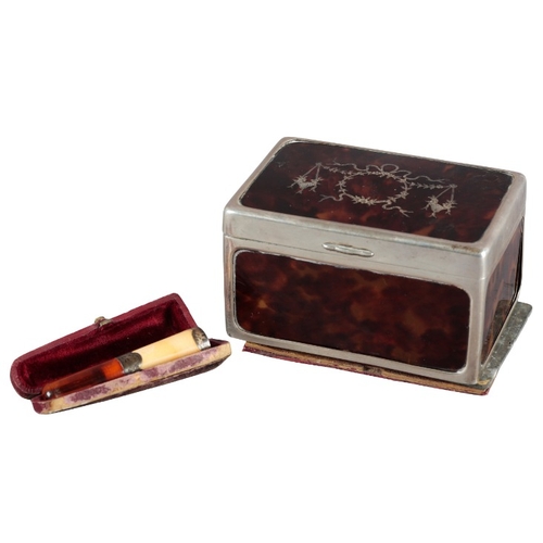 522 - AN EDWARD VII SILVER MOUNTED TORTOISESHELL CIGARETTE BOX

by J. Watson & Son, London 1909, of oblong... 