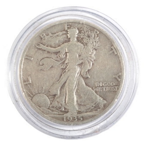 657 - SEVENTEEN AMERICAN SILVER 'WALKING LIBERTY' HALF DOLLARS

1917-1947, in a wooden display case; toget... 