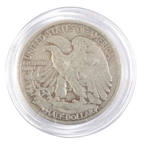 657 - SEVENTEEN AMERICAN SILVER 'WALKING LIBERTY' HALF DOLLARS

1917-1947, in a wooden display case; toget... 