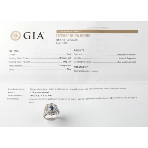 80 - A BURMA NO HEAT SAPPHIRE AND DIAMOND CLUSTER RING

in platinum, set with an oval cut Burmese sapphir... 