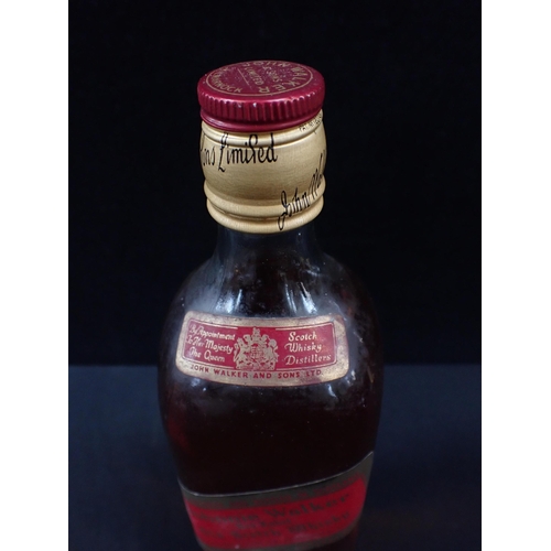 205 - A BOTTLE OF 1970s JOHNNIE WALKER RED LABEL OLD SCOTCH WHISKY

numbered 176/1986/BS/22 to the reverse... 