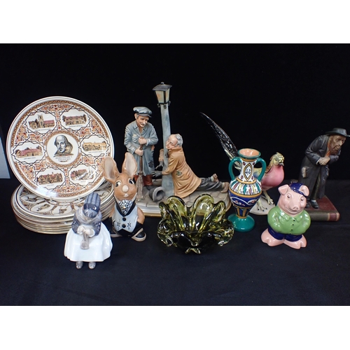 70 - A  ROYAL COPENHEGEN FIGURE

with a Canadian glass bowl, Wade pig and other mixed ceramics.