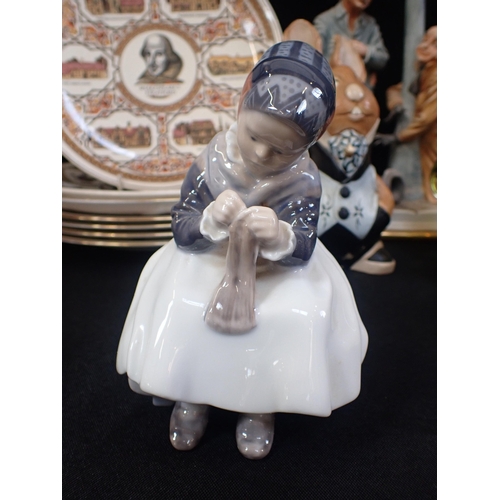 70 - A  ROYAL COPENHEGEN FIGURE

with a Canadian glass bowl, Wade pig and other mixed ceramics.