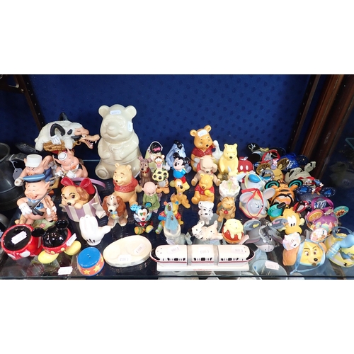71 - A COLLECTION OF DISNEY BRANDED ITEMS

mostly ceramic, animals and film characters