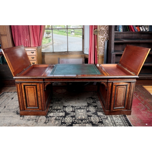 23 - AN IMPORTANT REGENCY BURR OAK AND EBONY STRUNG LIBRARY PEDESTAL DESK BY GEORGE BULLOCK

the rectangu... 