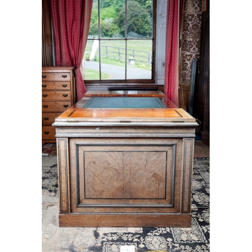 23 - AN IMPORTANT REGENCY BURR OAK AND EBONY STRUNG LIBRARY PEDESTAL DESK BY GEORGE BULLOCK

the rectangu... 