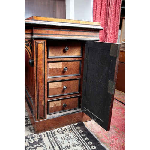 23 - AN IMPORTANT REGENCY BURR OAK AND EBONY STRUNG LIBRARY PEDESTAL DESK BY GEORGE BULLOCK

the rectangu... 