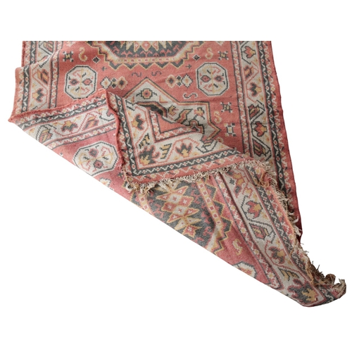 A GROUP OF FIVE PERSIAN RUGS 20th century, the largest with a red ...