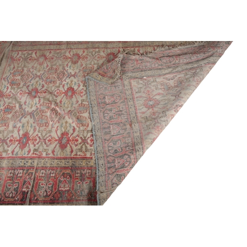 A GROUP OF FIVE PERSIAN RUGS 20th century, the largest with a red ...