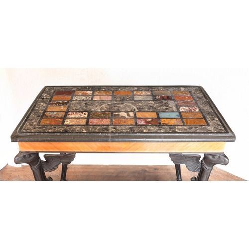 4 - A PAIR OF REGENCY CAST IRON AND TULIPWOOD CENTRE TABLES IN THE MANNER OF THOMAS HOPE

circa 1815, on... 