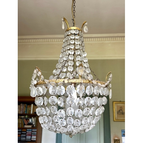 48 - A GILT METAL AND CUT GLASS BASKET CHANDELIER

20th century, approximately 50cm drop

To be removed a... 