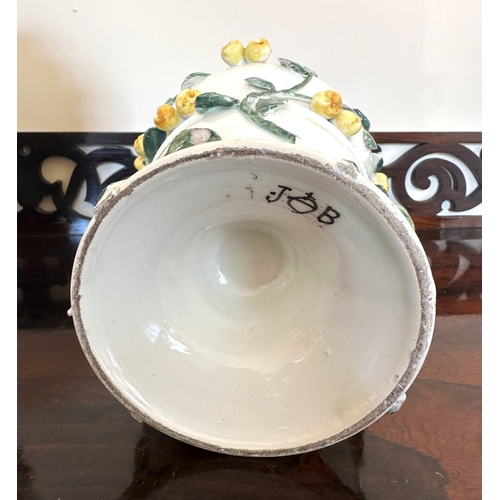 49 - A NEAR PAIR OF CONTINENTAL FAIENCE POT POURRI VASES

of baluster form with pierced covers and collar... 