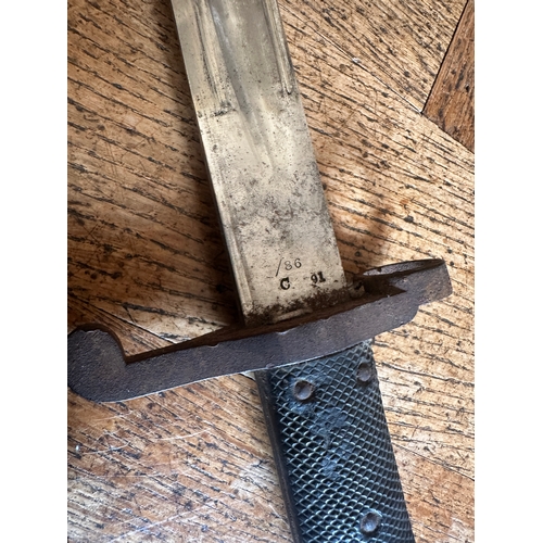 54b - A SOUTH EAST ASIAN KRIS DAGGER

probably Malaysian late 19th/early 20th century, with carved wood ha... 