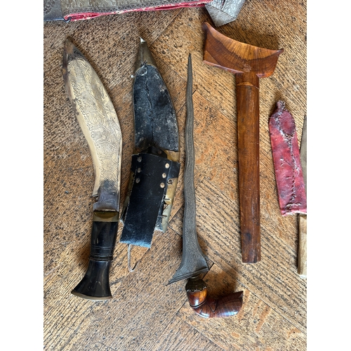 54b - A SOUTH EAST ASIAN KRIS DAGGER

probably Malaysian late 19th/early 20th century, with carved wood ha... 