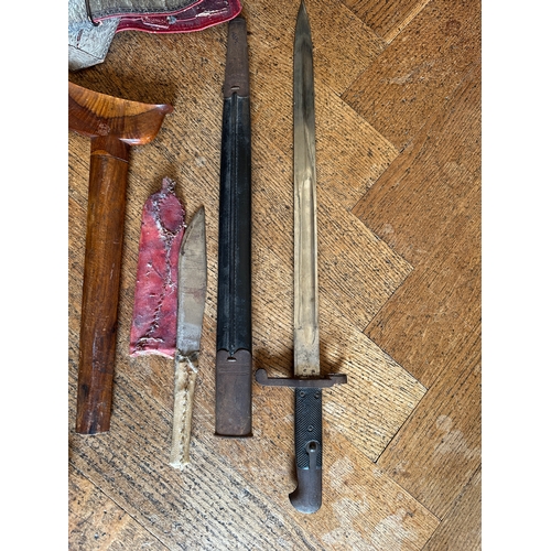 54b - A SOUTH EAST ASIAN KRIS DAGGER

probably Malaysian late 19th/early 20th century, with carved wood ha... 