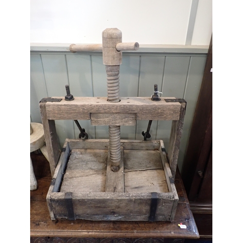 12 - A VINTAGE WOODEN APPLE PRESS

a traditional wooden butter churn or 'plump', and two ash washing doll... 